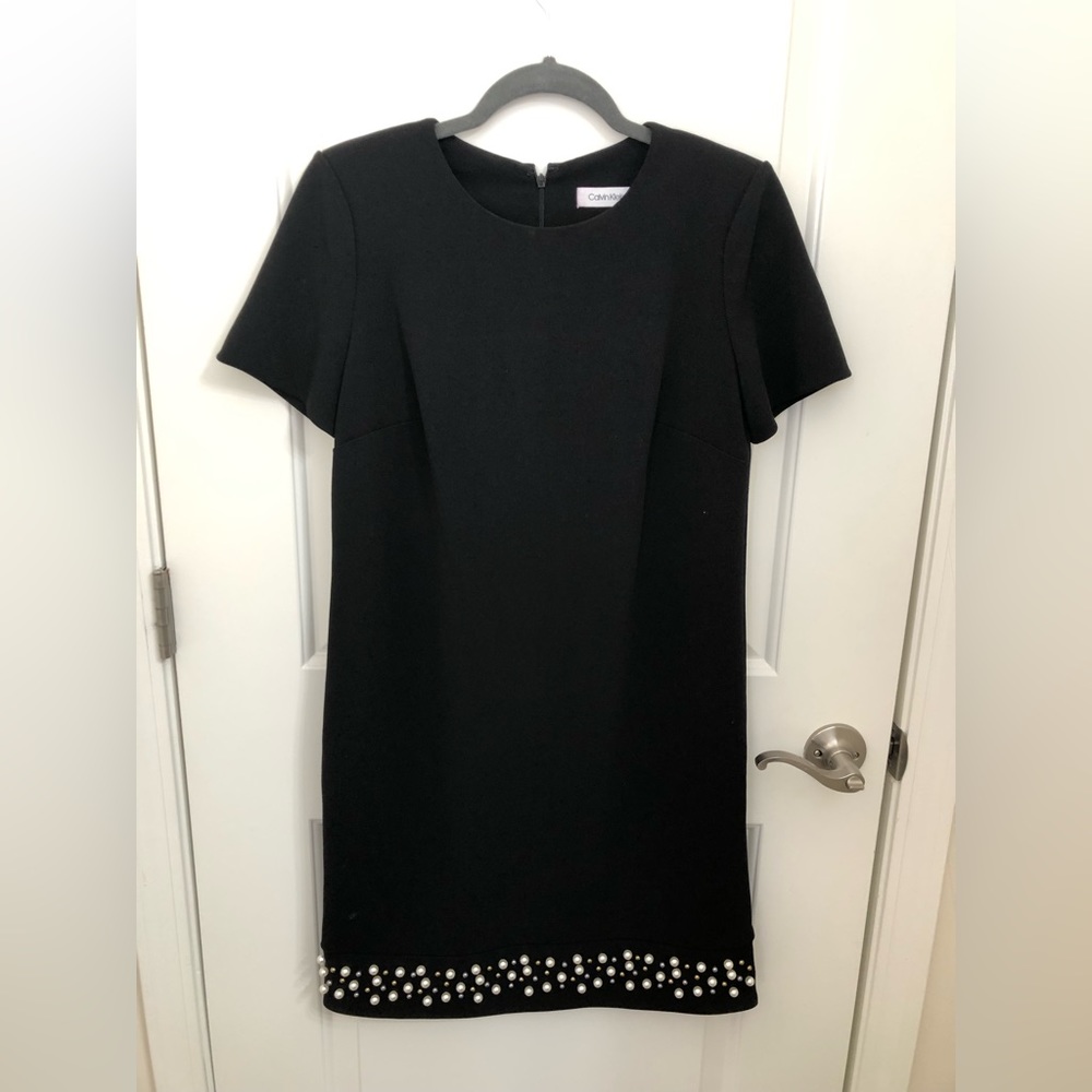 Short black dress with pearl details